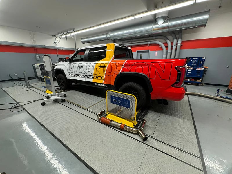Magnuson's wrapped 2022+ Toyota Tundra Performance Pack development truck on a chassis dyno